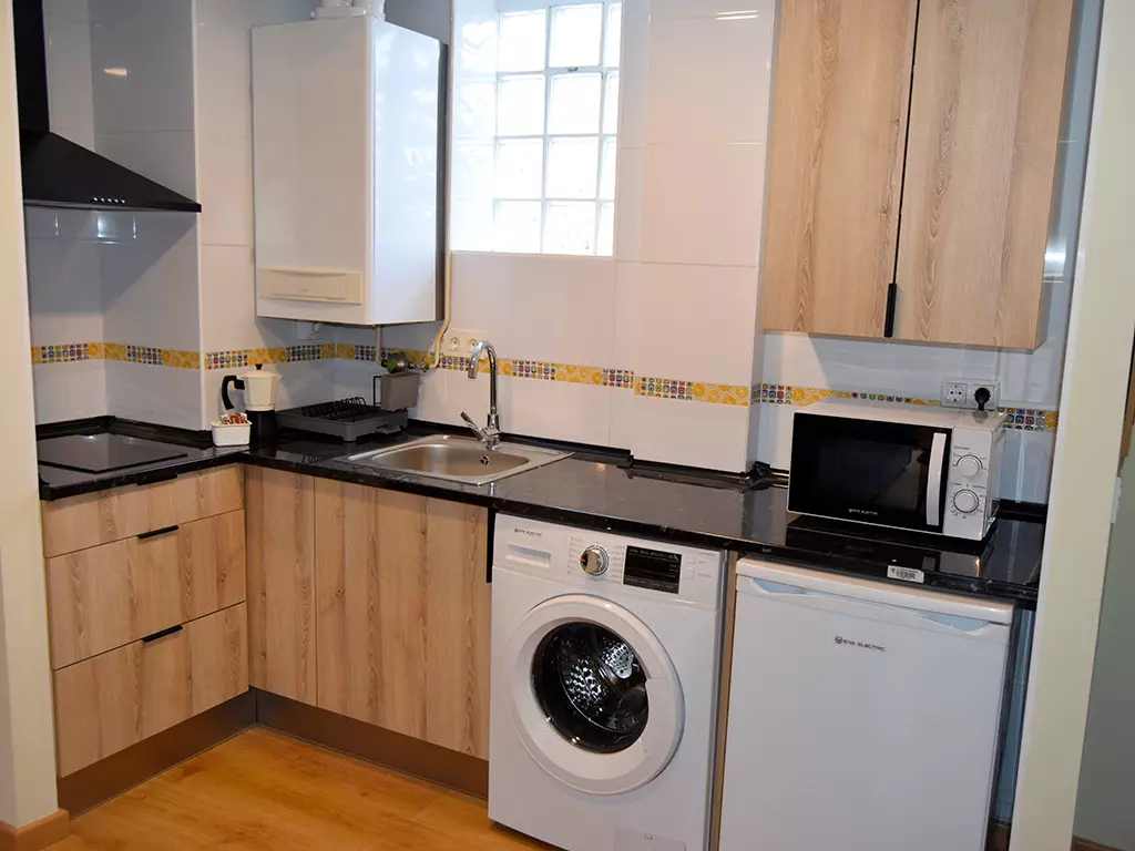 Apartamentos Escarrilla Suites 3000